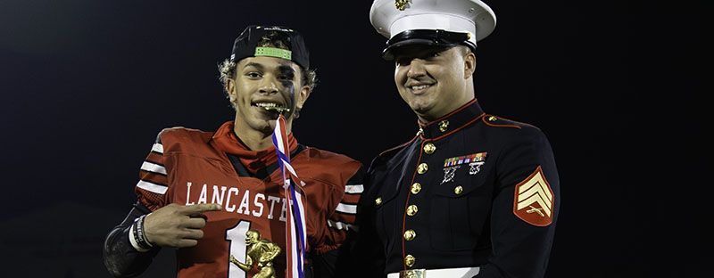 Jayden Colon celebrating with a Marine after the victory