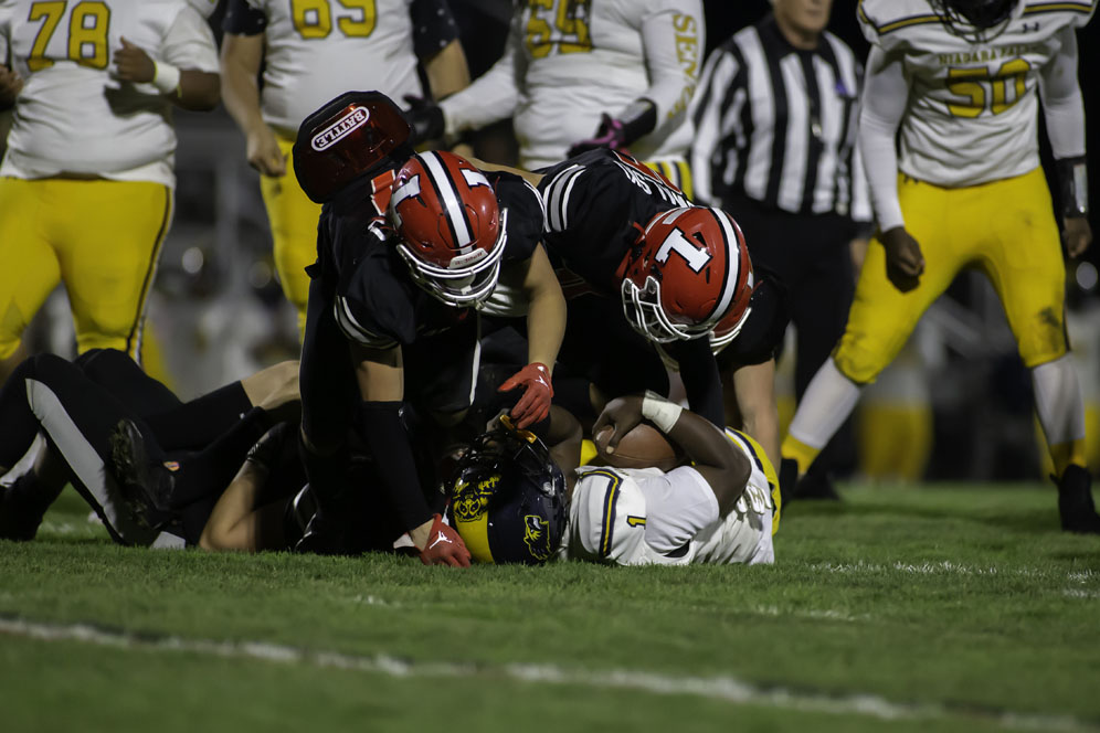 Lancaster defense making the tackle