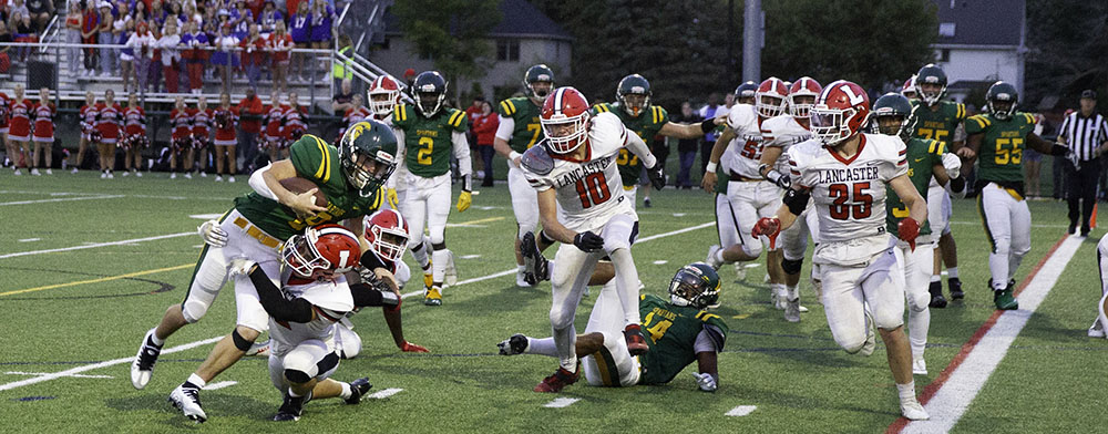 Frontier running the ball against Williamsville North defense