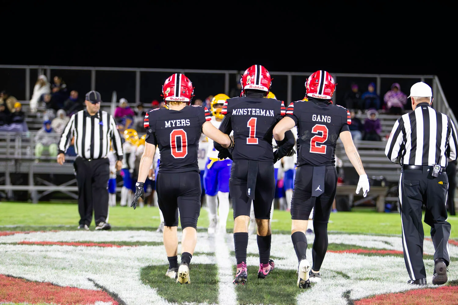 Captains walking to the coin toss