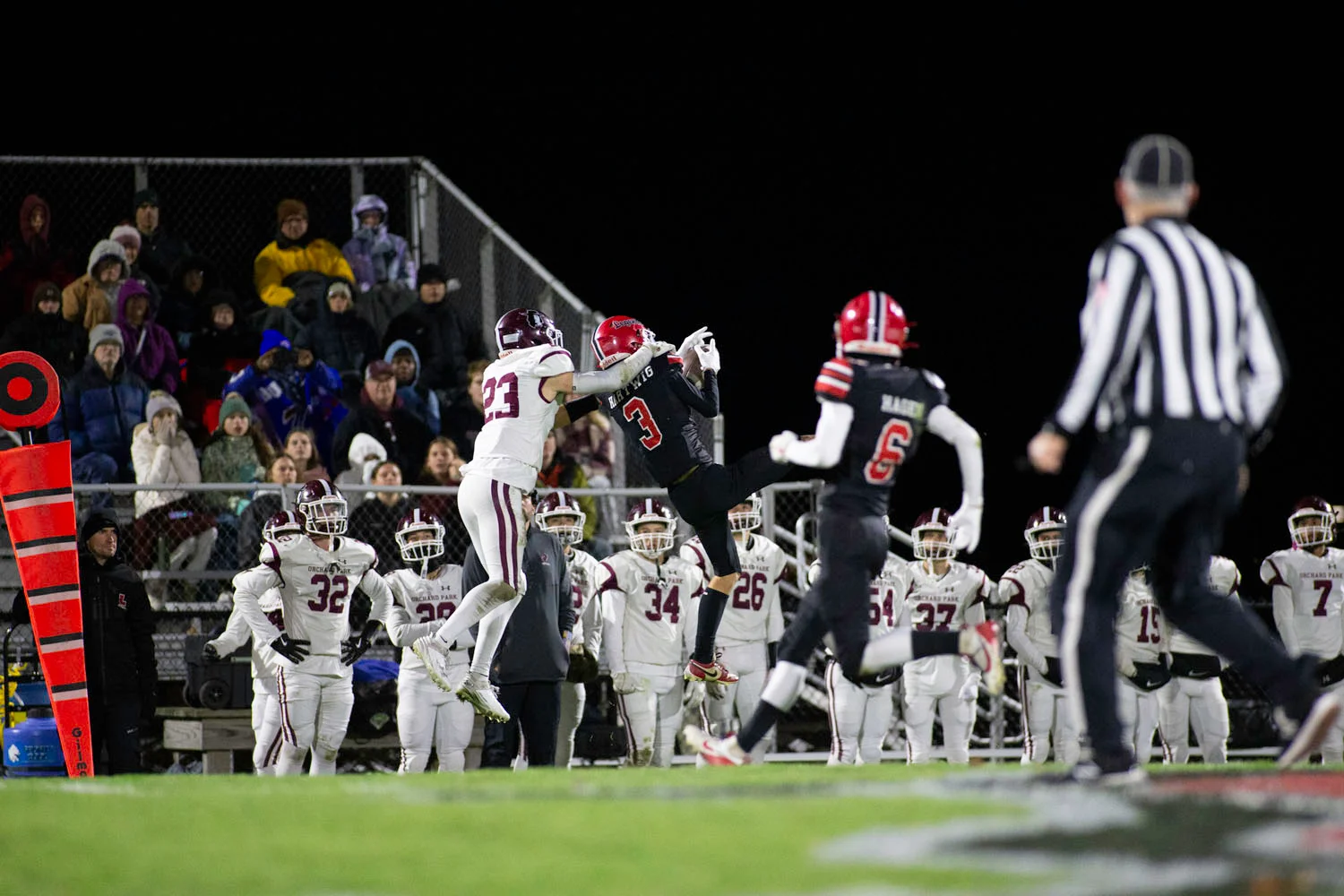 WR going up for the catch