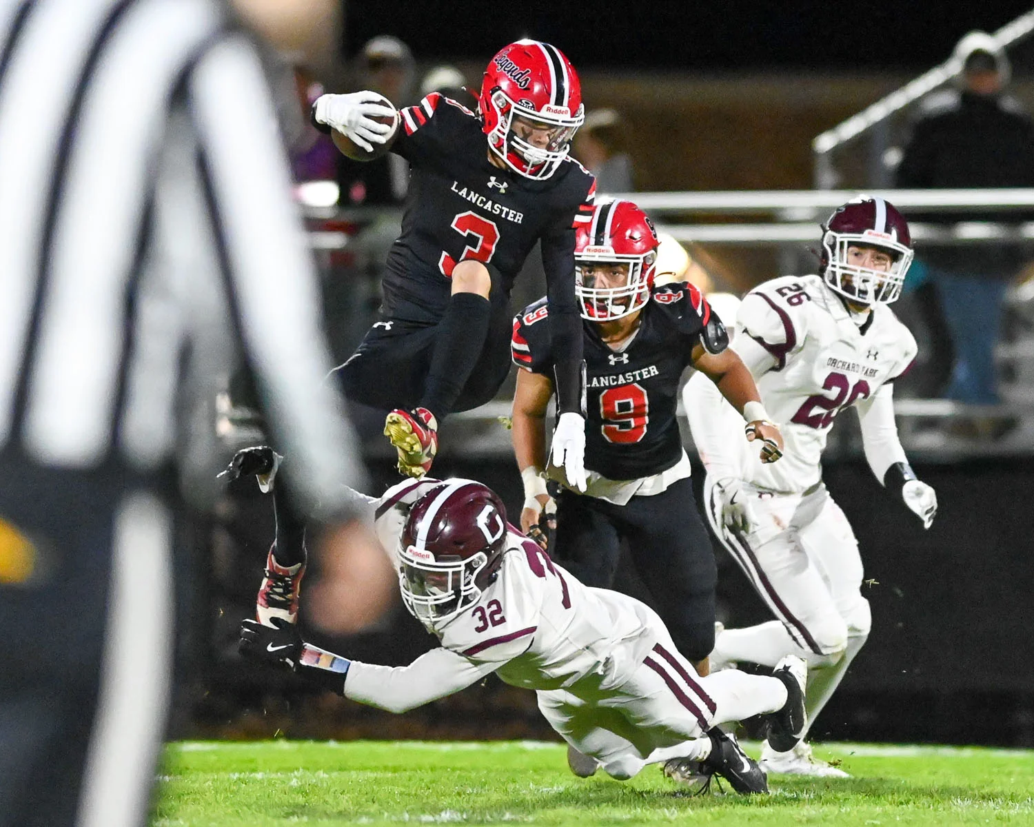 Ball Carrier jumping over the defense