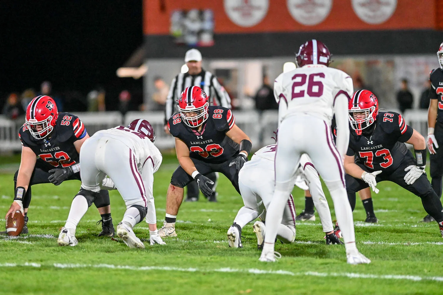 Legends ball carrier running down the field