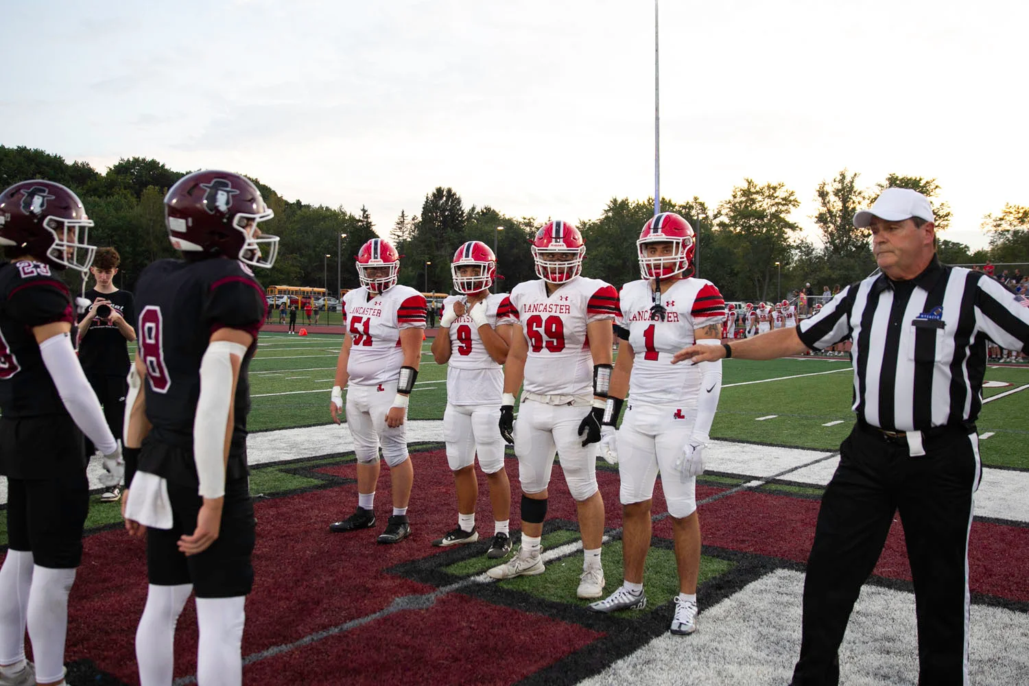 Captains for the both teams at midfield