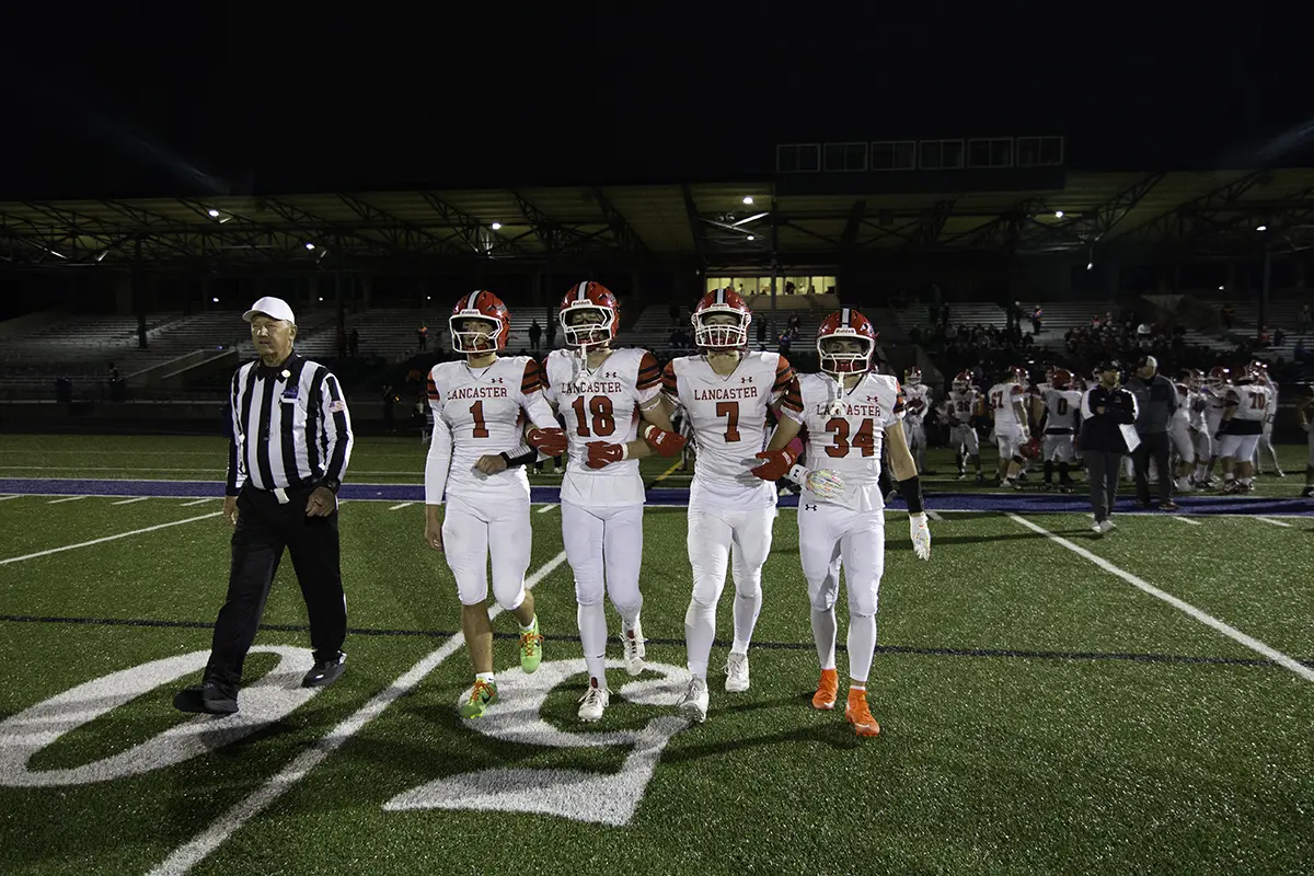 Captains going out to the coin toss
