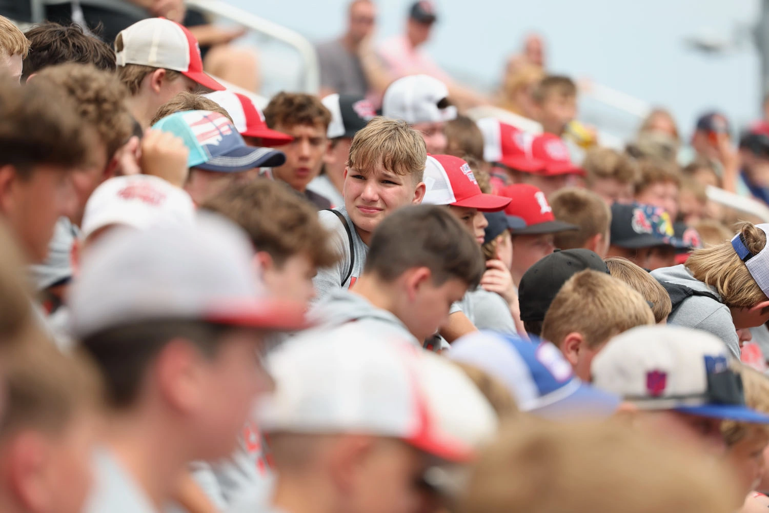Camper talkking to others in the stands