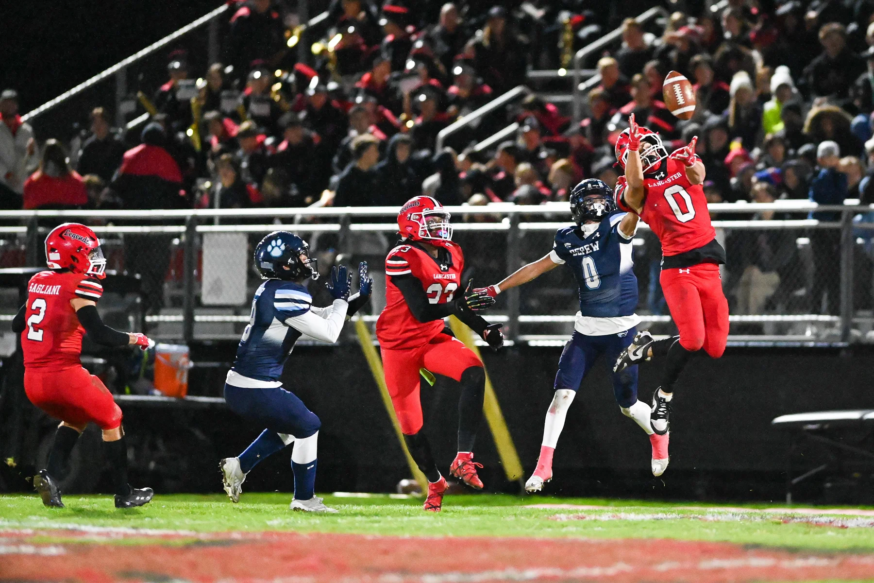 DB climbing the ladder to get the ball