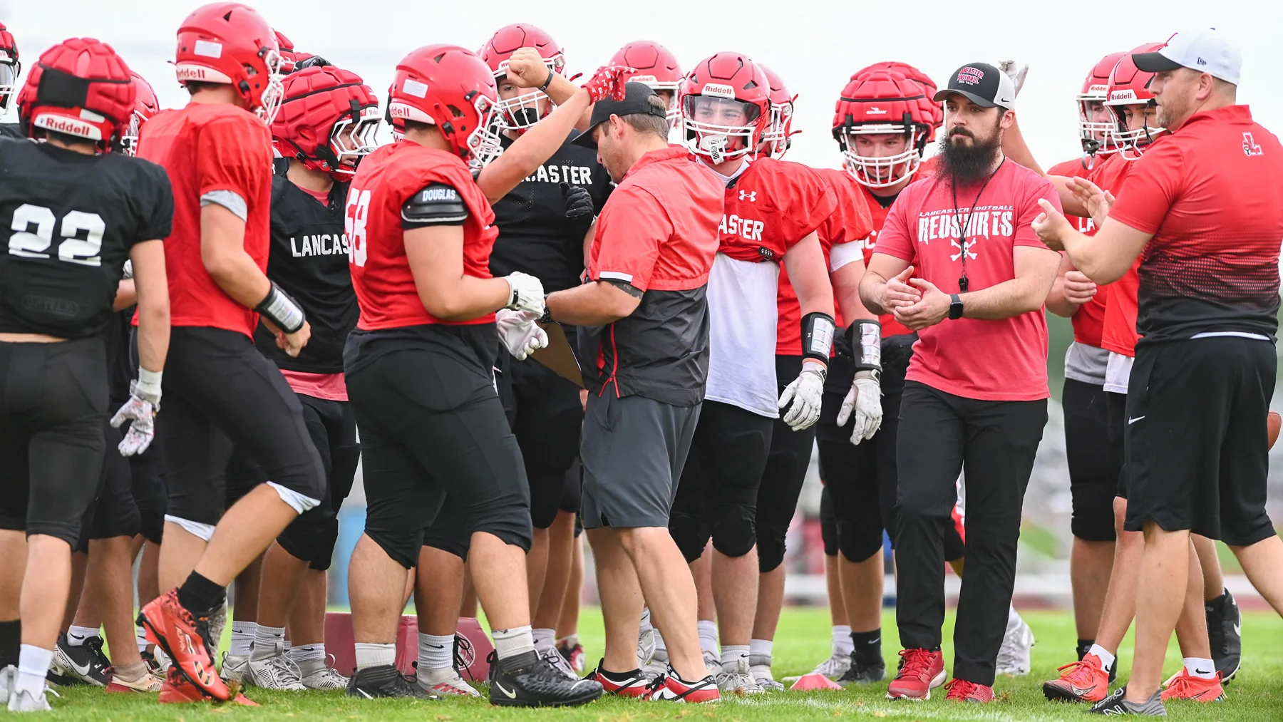 Coach Rupp breaking the huddle
