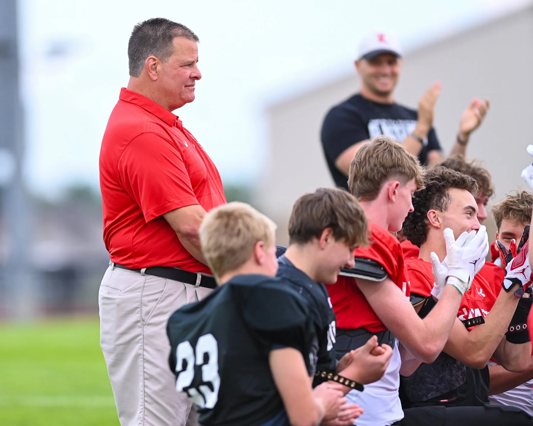 Coach Wild with a Big Smile