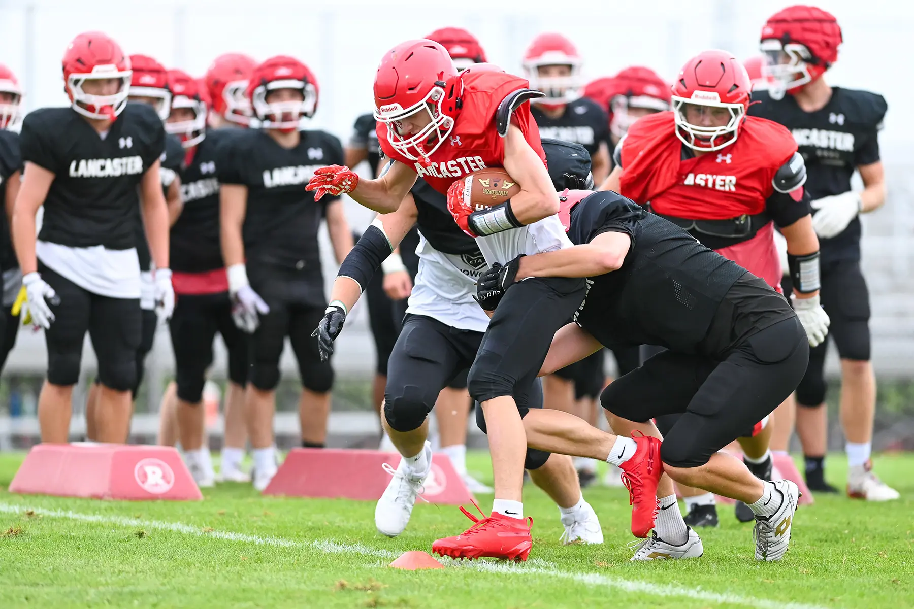 Ball carrier shaking off the defender