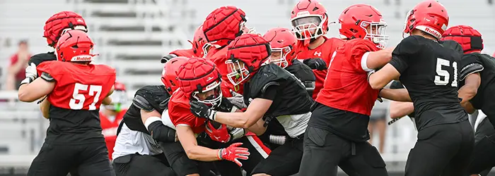 Coach Symanski talking to the campers