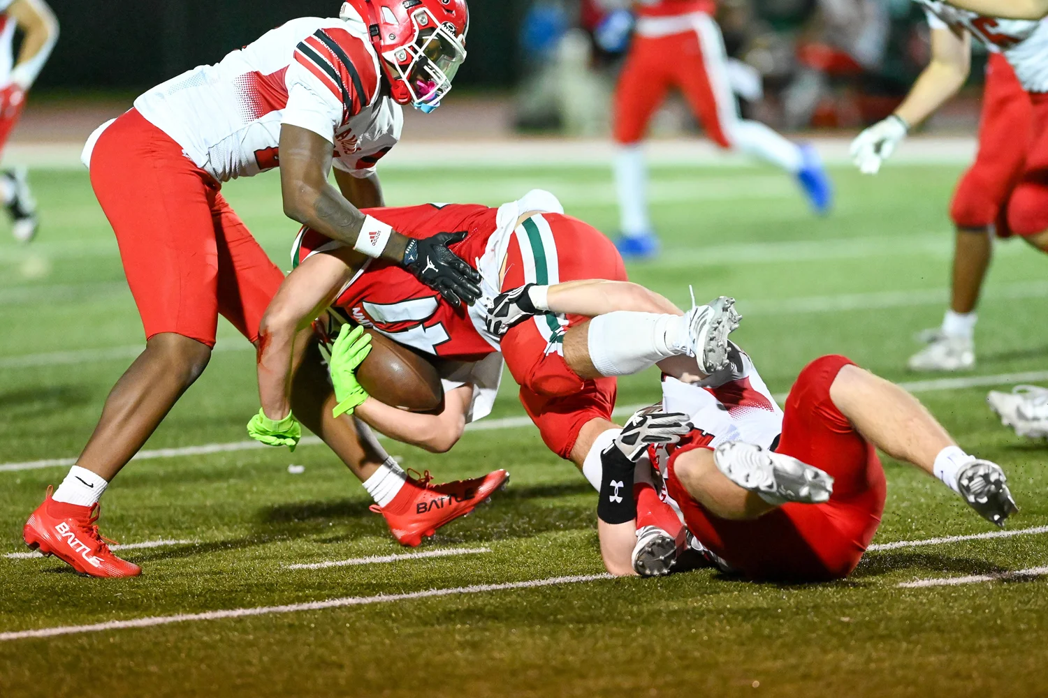 Defense bringing down the RB