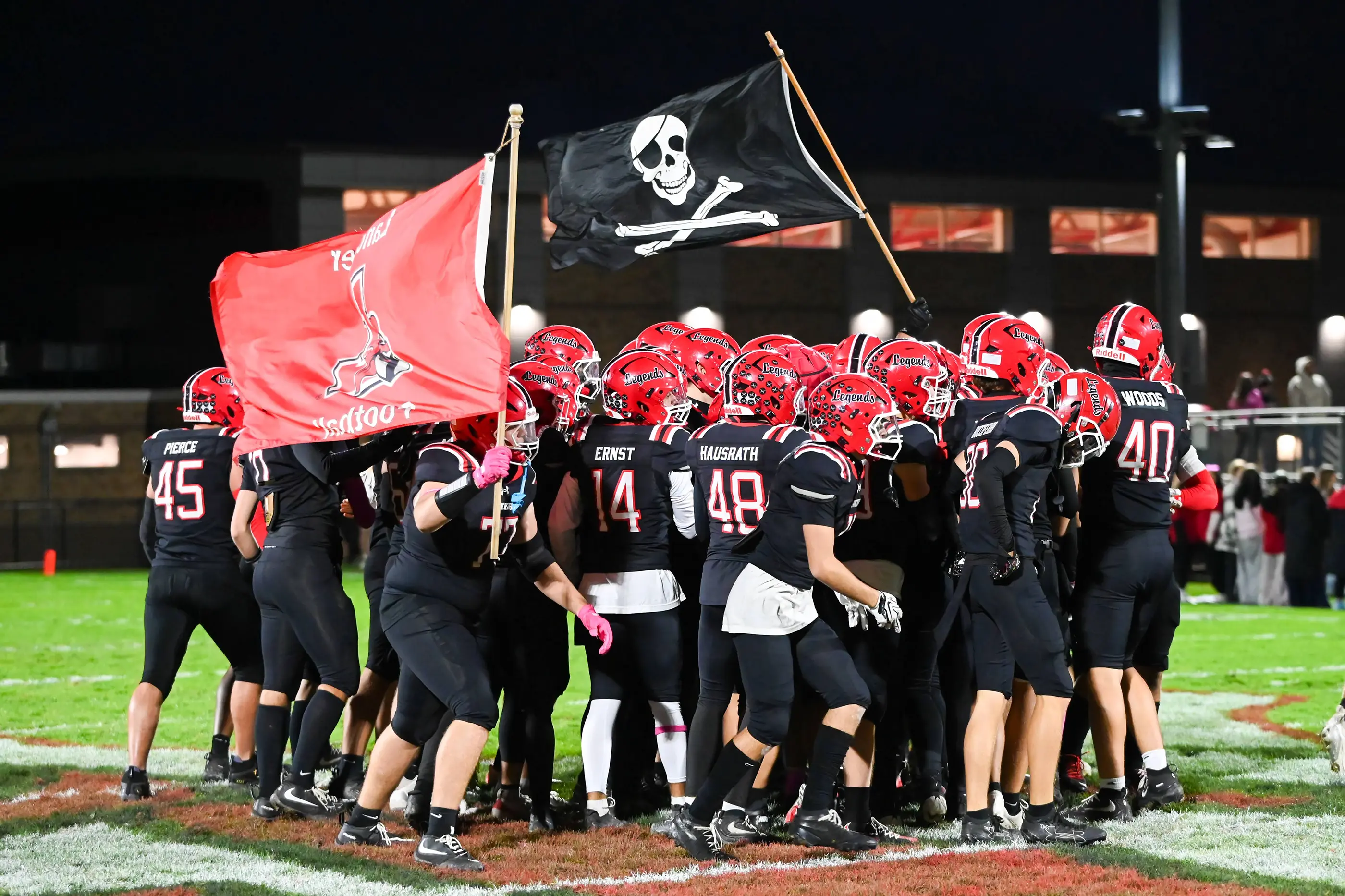 Lancaster Legends huddle on the field