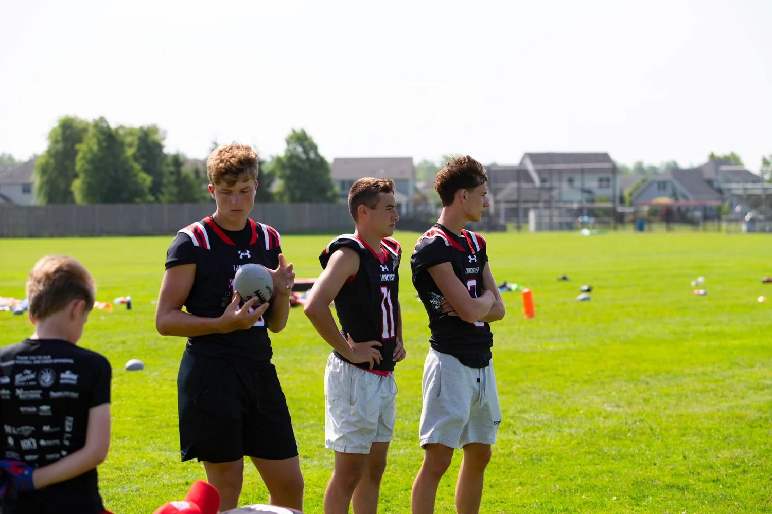 Players looking over the campers at the Lancaster Football Camp 2026
