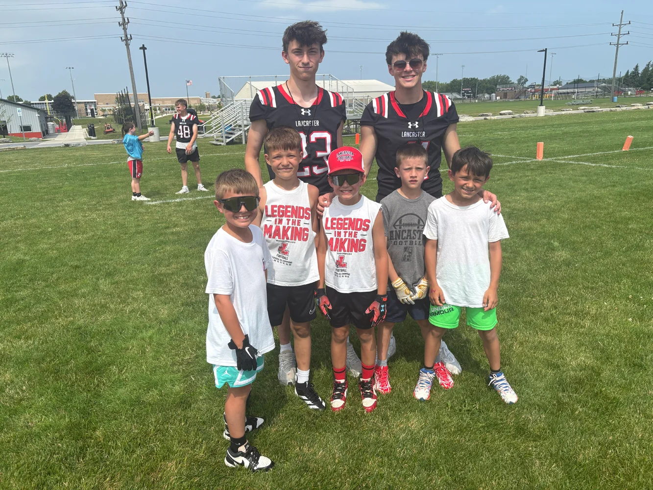Campers and players posing for the camera at the Lancaster Football Camp 2026