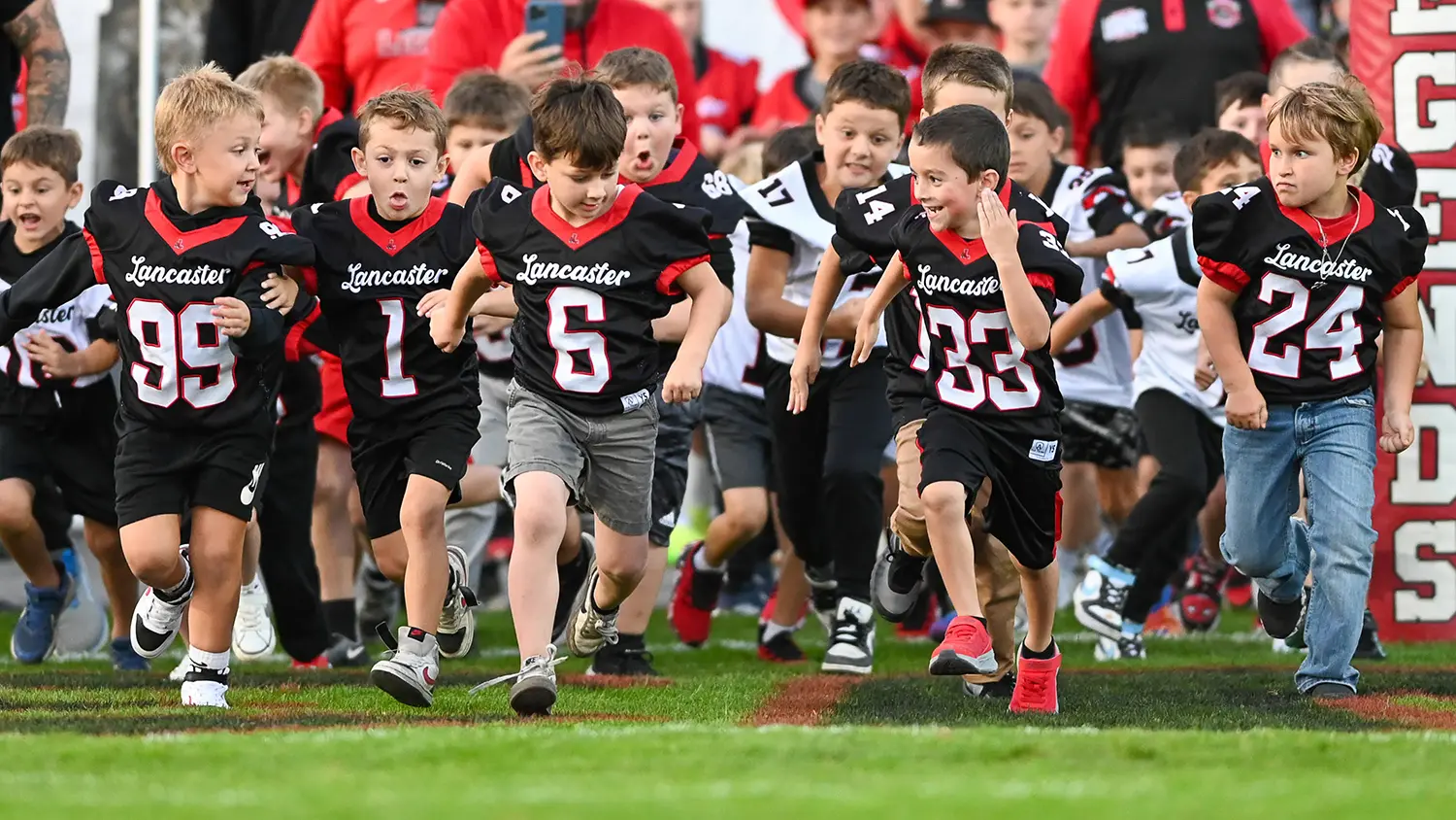 Little League team hitting the field