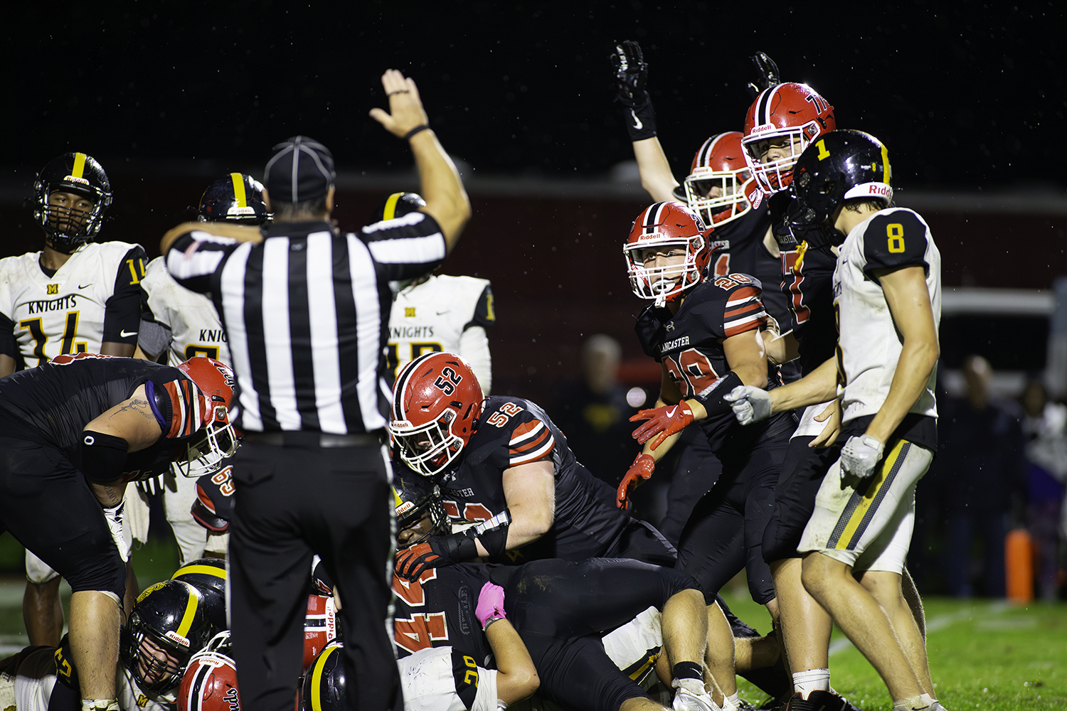 Lancaster scores a TD