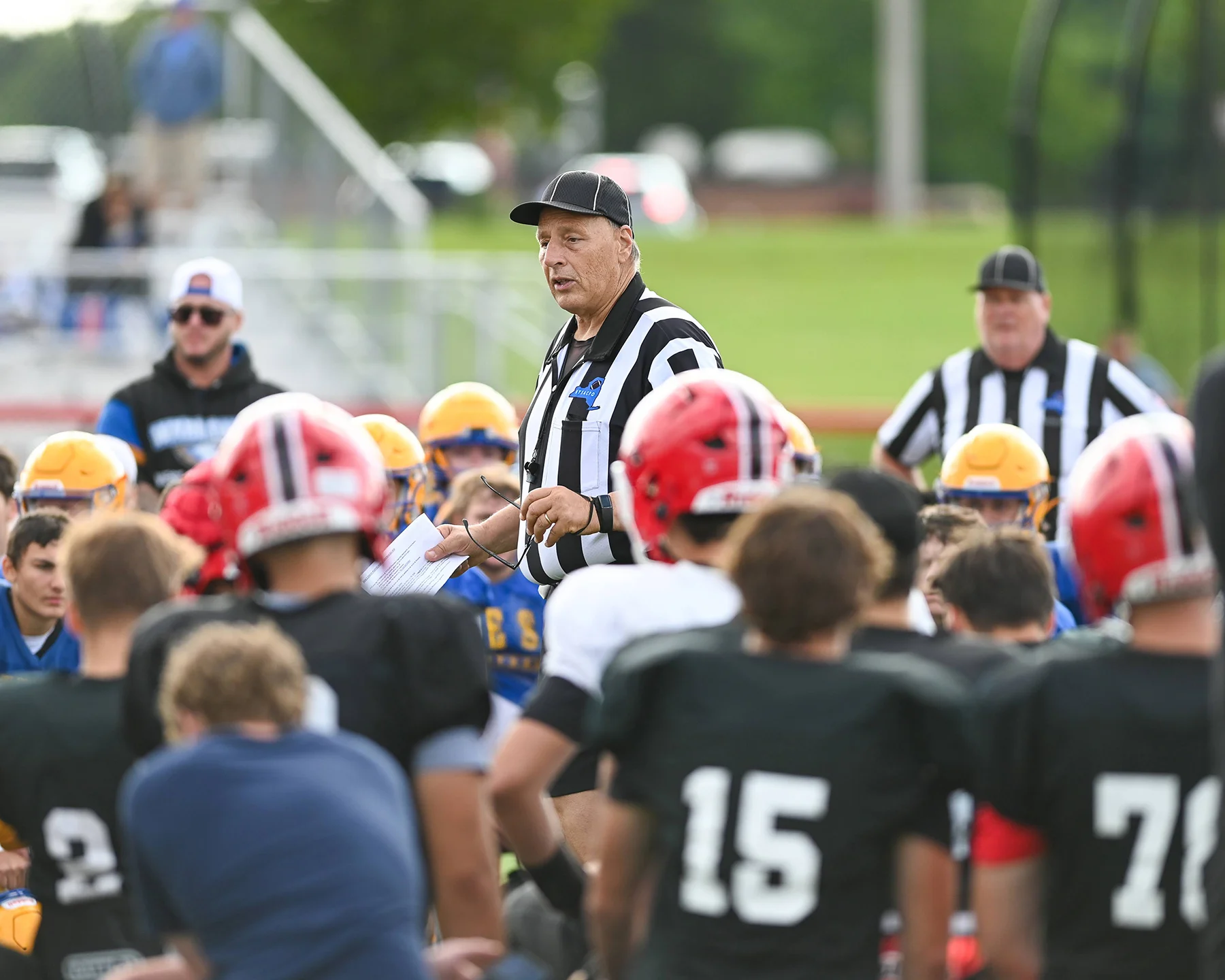 Official talking to the teams at the Lancaster Football Scrimmage 2026