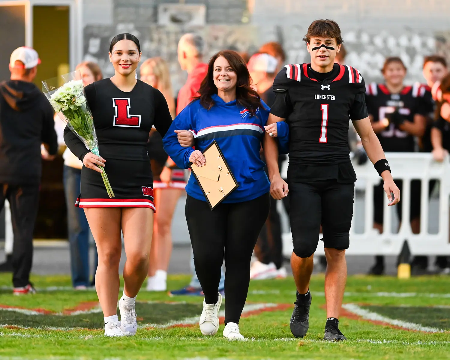 Lancaster Cheerleader, Football Player and Teacher on Teacher Appreciation Night