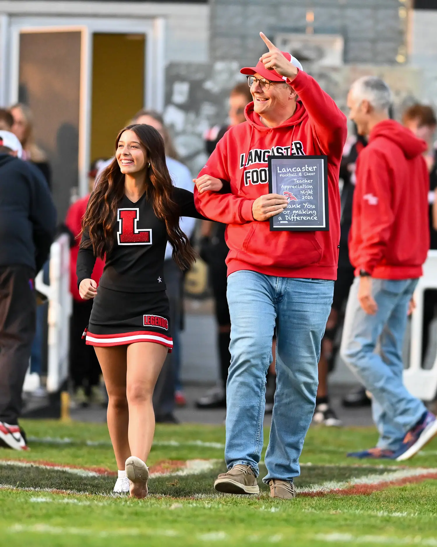 Lancaster Cheerleader on teacher on Teacher Appreciation Night