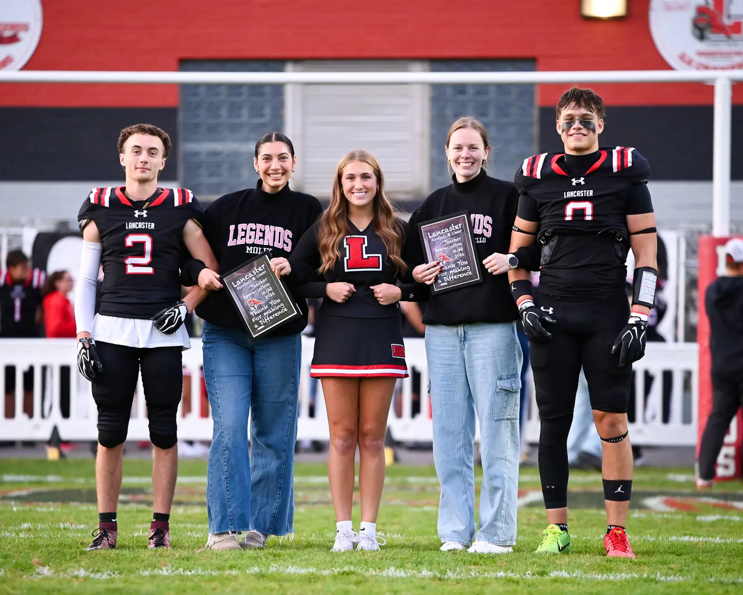 Players, Cheerleader, and Teachers on Teacher Appreciation Night